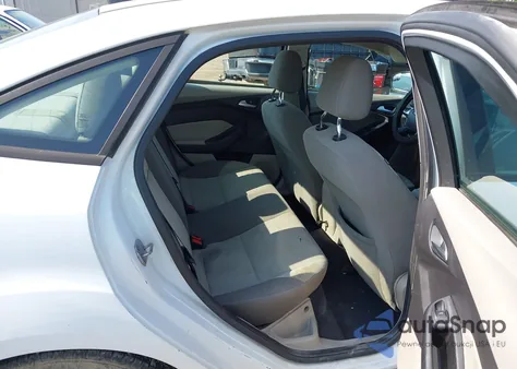 2012 Ford Focus Se z USA, uszkodzony, nr VIN 1FAHP3F23CL214630